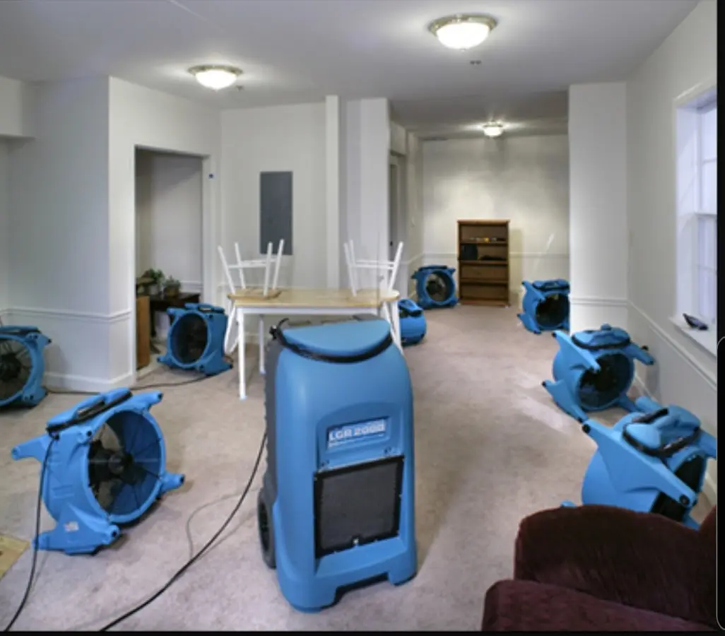 Air movers and dehumidifier setup for Water Damage Restoration in Clover Creek
